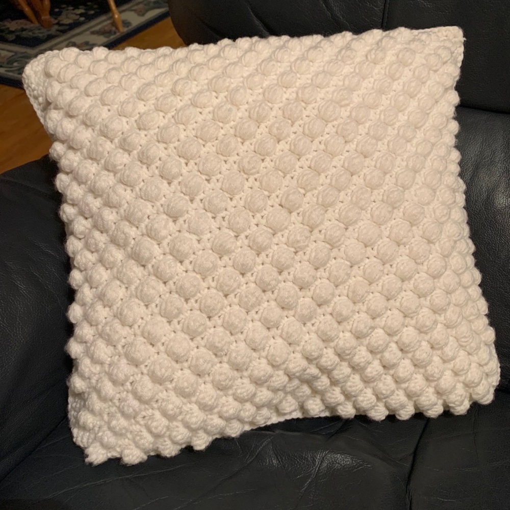 Homemade bobble stitch pillow